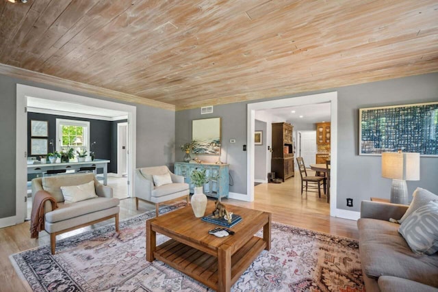 living room featuring wood ceiling and light hardwood / wood-style flooring