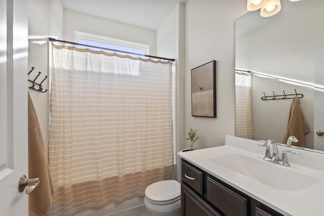 full bathroom with vanity, toilet, and shower / bath combo with shower curtain