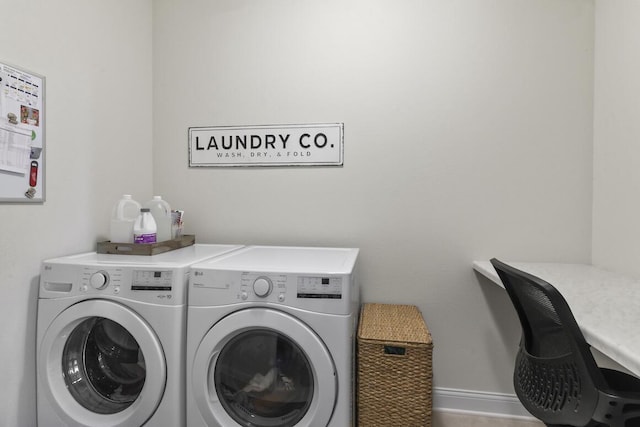 laundry room featuring washer and clothes dryer