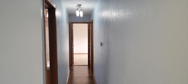 hallway featuring hardwood / wood-style flooring