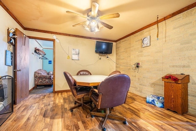 office with hardwood / wood-style flooring, ceiling fan, and ornamental molding