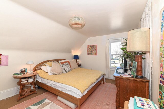 bedroom with vaulted ceiling