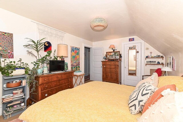 bedroom with vaulted ceiling