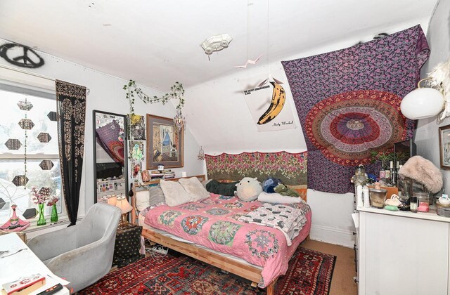 bedroom with vaulted ceiling