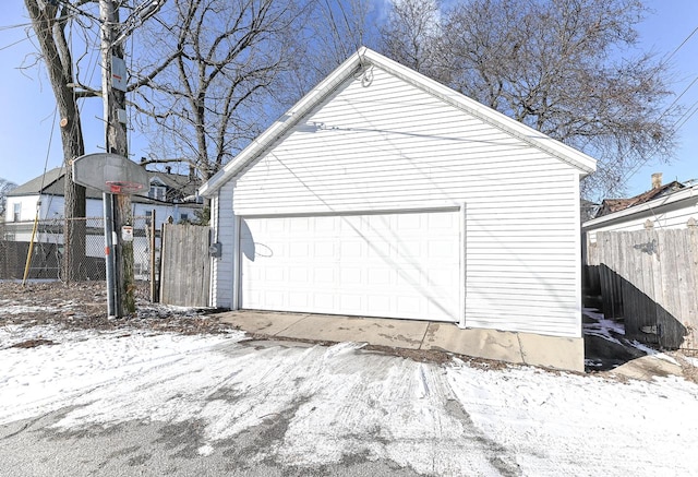 view of snow covered garage