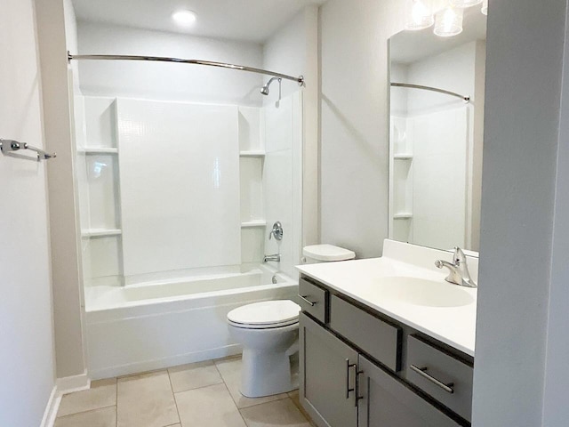 full bathroom with vanity, tile patterned flooring, washtub / shower combination, and toilet