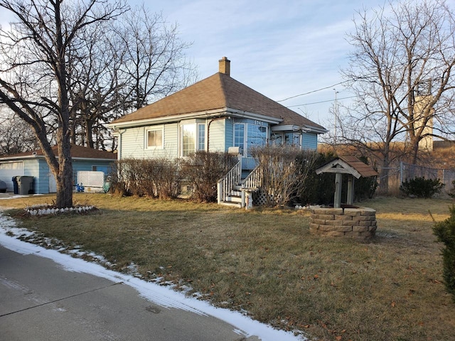 view of front of home with a front yard