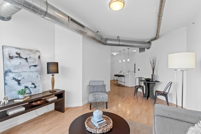 living room with hardwood / wood-style floors