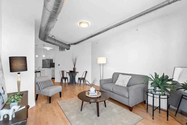 living room featuring light hardwood / wood-style floors