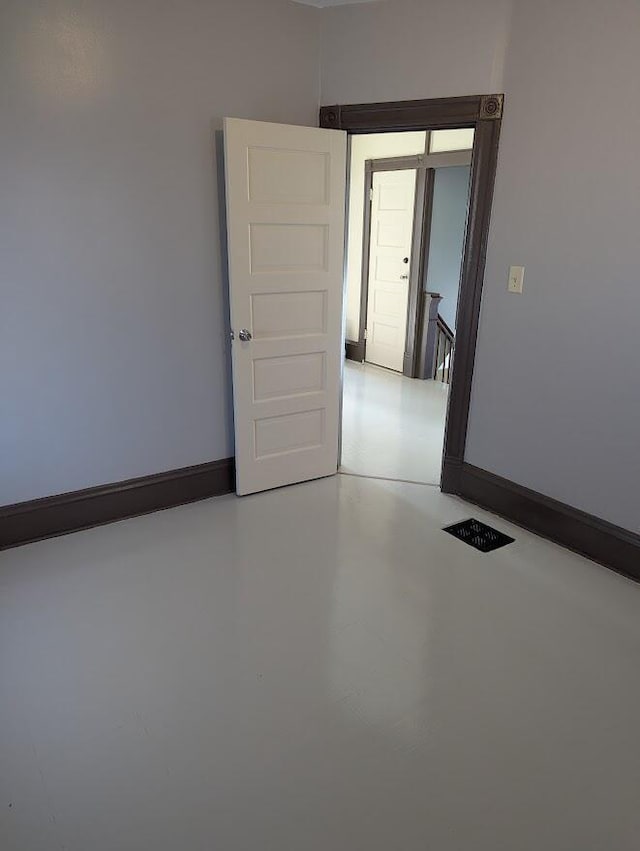 empty room featuring concrete floors