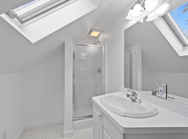 bathroom featuring vanity, lofted ceiling, and a shower with door