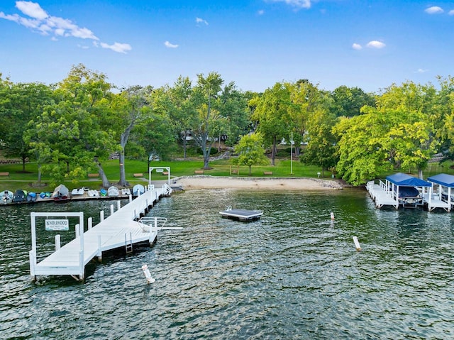 dock area featuring a water view