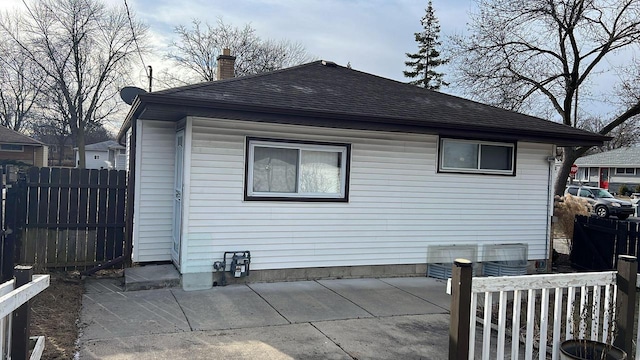 rear view of house with a patio