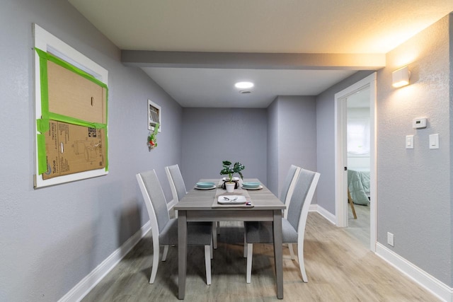 dining room featuring light hardwood / wood-style flooring