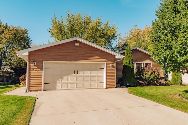 garage with a yard