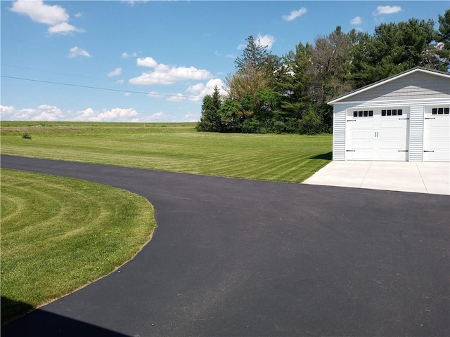 garage with a lawn