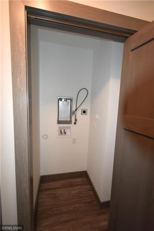 101 Nelson St, Elmwood, WI 54740 - clothes washing area with washer hookup, electric dryer hookup, and dark hardwood / wood-style floors