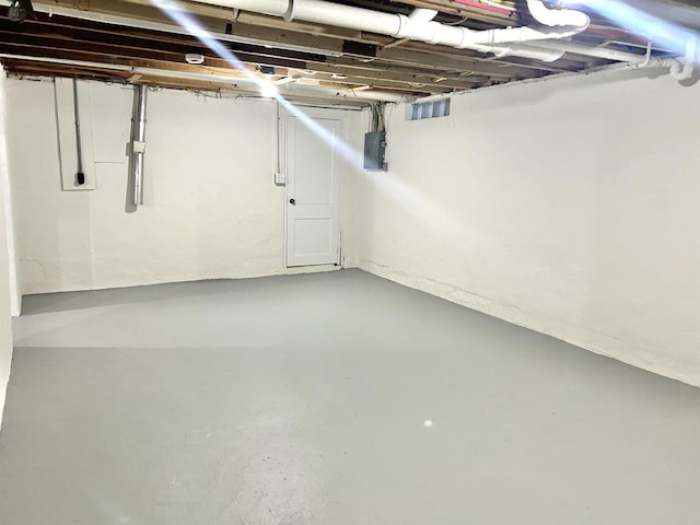 basement with electric panel