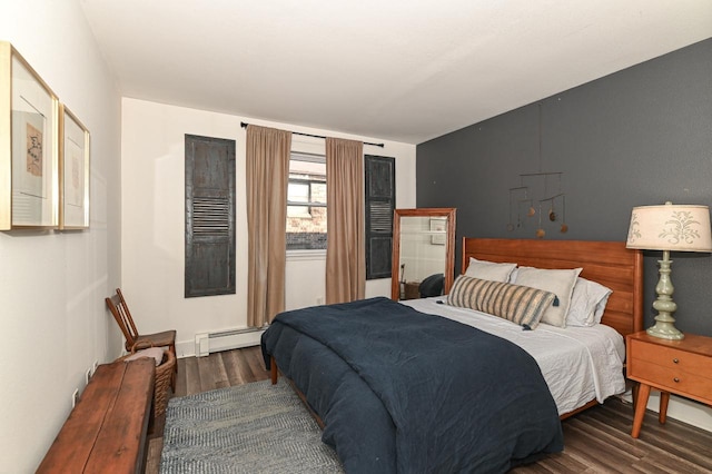 bedroom featuring dark wood-type flooring and a baseboard radiator