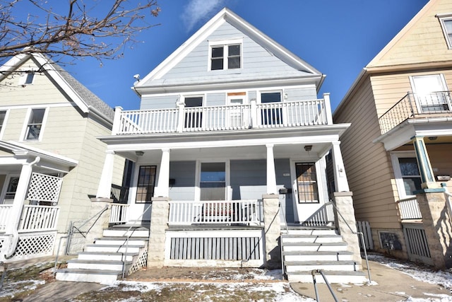 view of front of house with a balcony and a porch