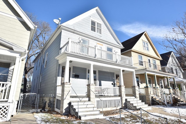 view of front facade with a porch and a balcony