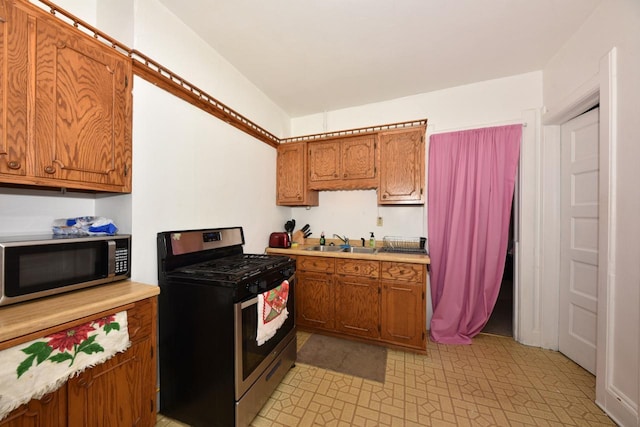 kitchen featuring sink and stainless steel appliances