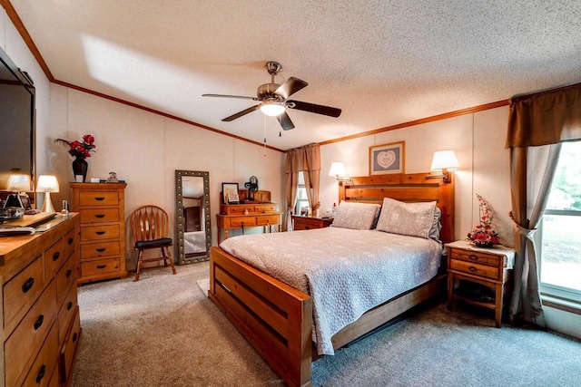 carpeted bedroom featuring ceiling fan, a textured ceiling, and ornamental molding