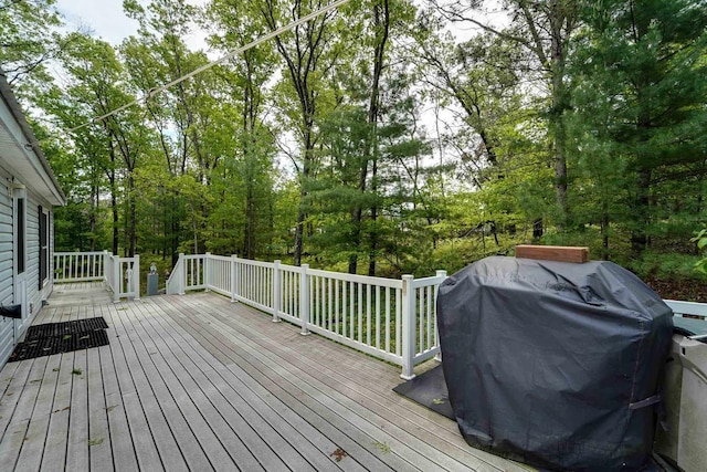 wooden deck featuring grilling area