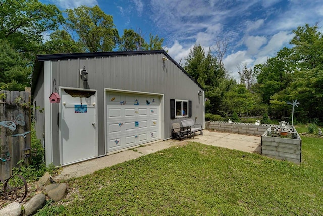 garage with a lawn