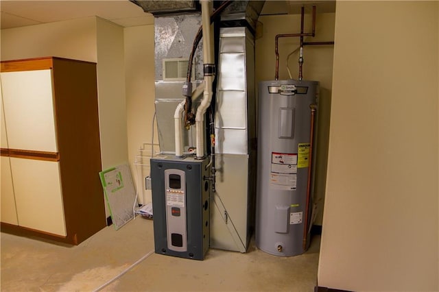 utility room with heating unit and water heater