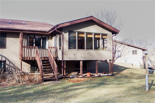 back of house with a yard