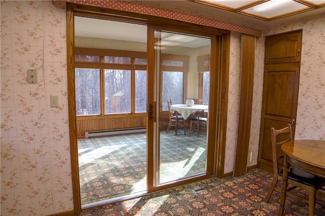 entryway with a baseboard heating unit