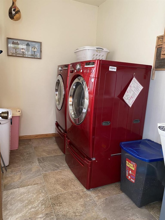 laundry room with separate washer and dryer