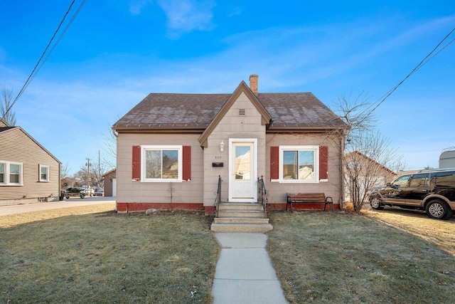 bungalow with a front lawn