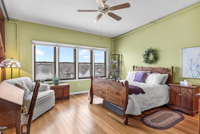 bedroom featuring ceiling fan and light wood-type flooring