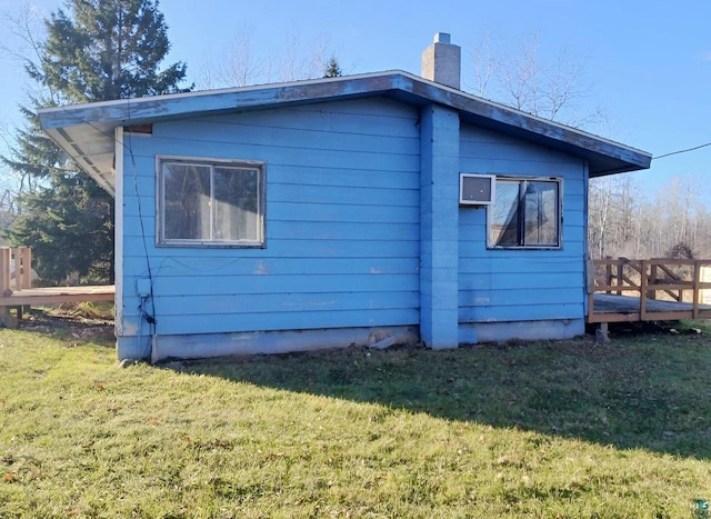 view of home's exterior featuring a yard