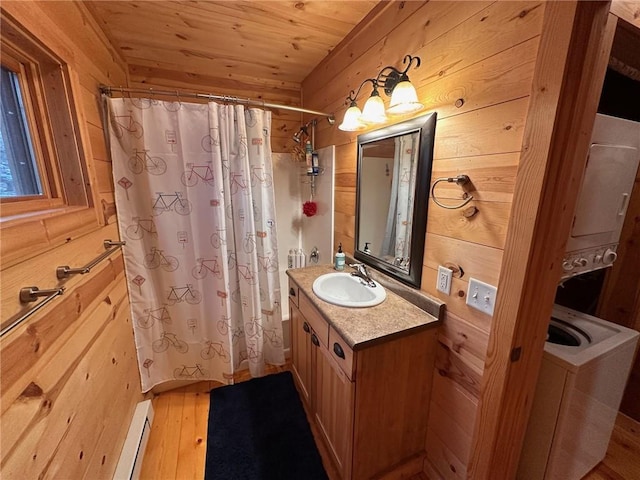 bathroom with wooden ceiling, baseboard heating, wood walls, vanity, and a shower with shower curtain