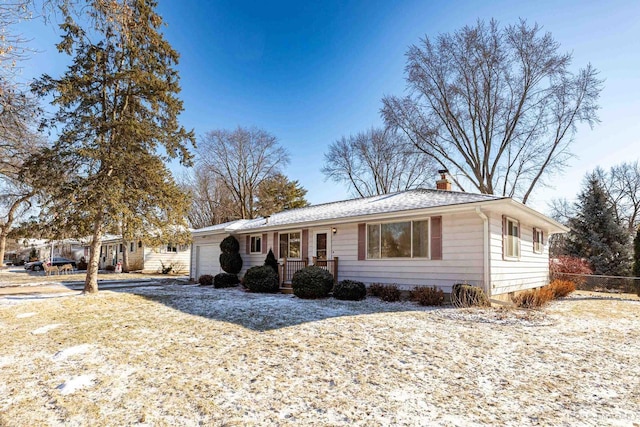 single story home featuring a garage