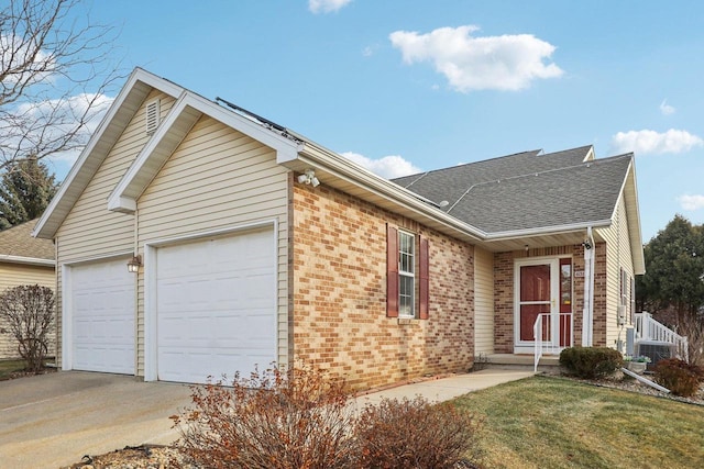 ranch-style house featuring a garage