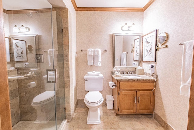 bathroom featuring a shower with door, vanity, ornamental molding, and toilet