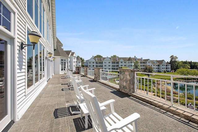 view of patio / terrace featuring a water view