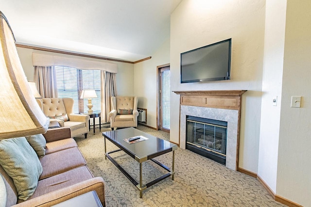 carpeted living room featuring lofted ceiling and a tiled fireplace