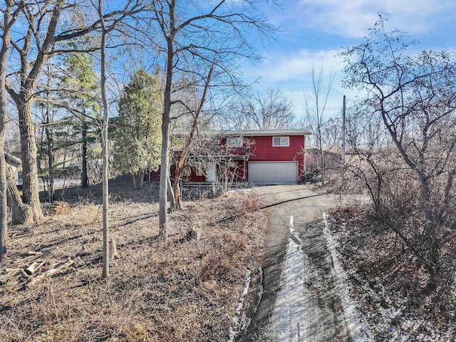 view of front of property with a garage