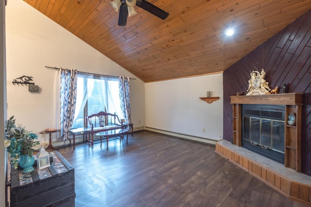 living room with wooden ceiling, a baseboard radiator, and vaulted ceiling