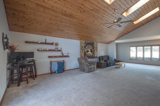 unfurnished living room with carpet floors, high vaulted ceiling, a skylight, ceiling fan, and wood ceiling