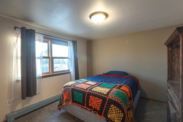 carpeted bedroom featuring baseboard heating