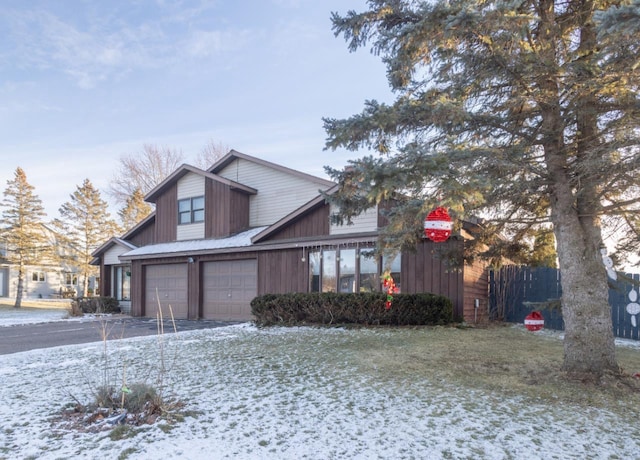 view of front of property with a garage