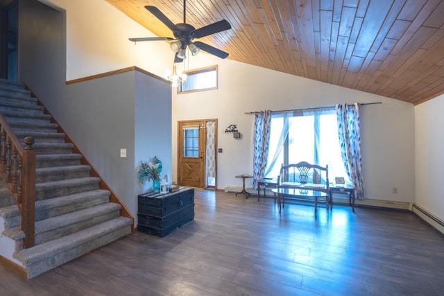 foyer with ceiling fan, dark hardwood / wood-style flooring, wooden ceiling, and a high ceiling