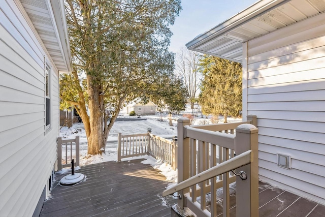 view of snow covered deck