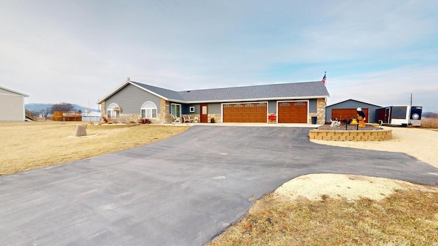 ranch-style home with a garage